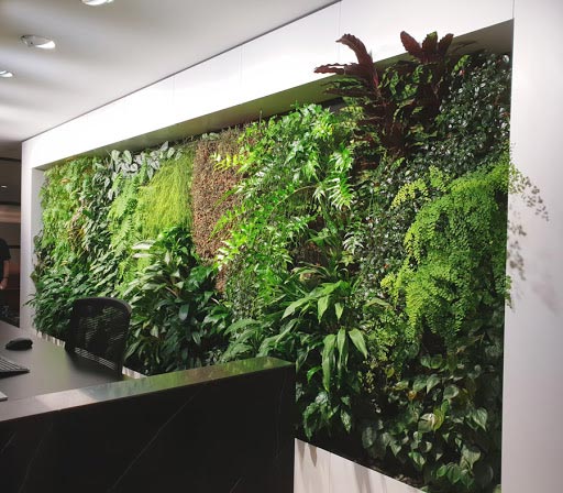 仿真植物前台背景墙，公司前台仿真植物墙-成都芮芸景观艺术公司